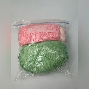 Yarn 3 different colors. Pink light pink and green.long length sewing crocheting
